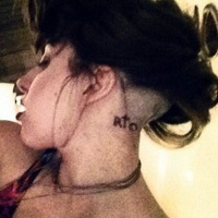 Лейди Гага си татуира "RIO"